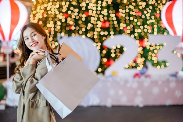 woman doing christmas shopping banner