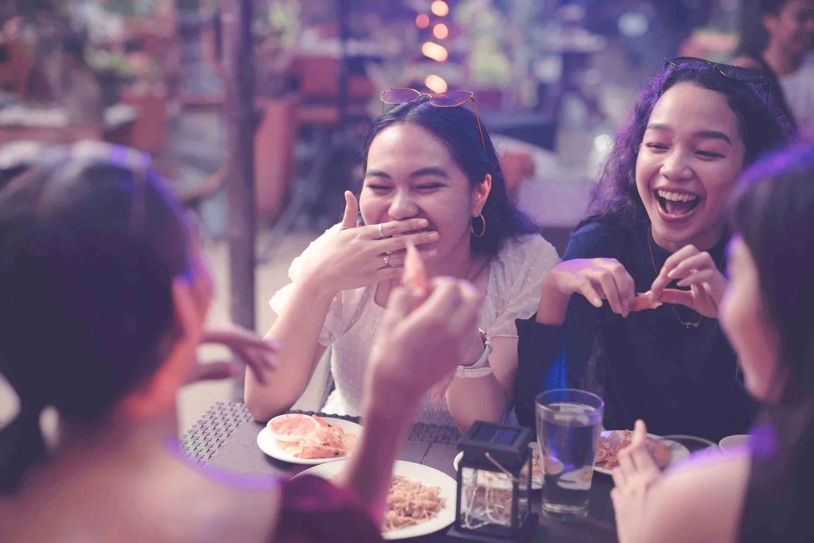 women chatting in a party